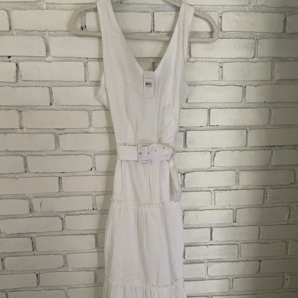 Ann Taylor white long flowy dress. Never worn, tag on, smoke free dog free home.